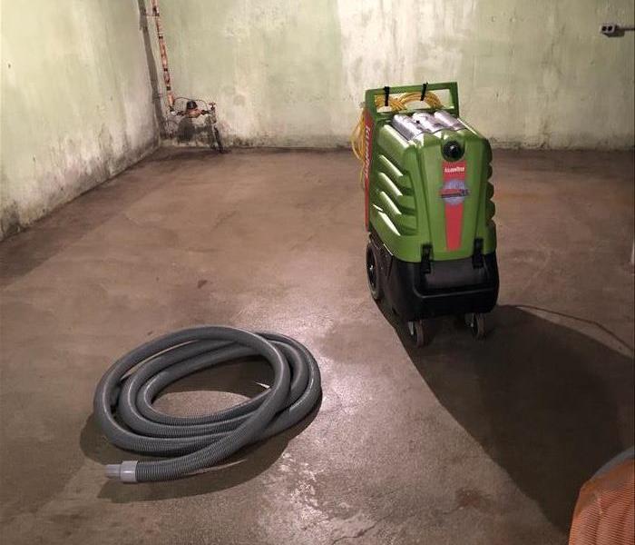 Drying equipment setup in a basement after water damage