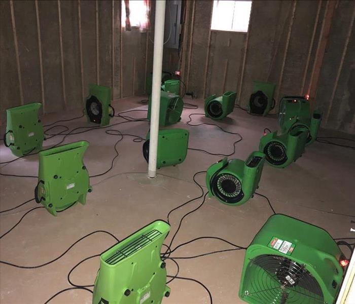 Drying equipment setup in the basement of a house