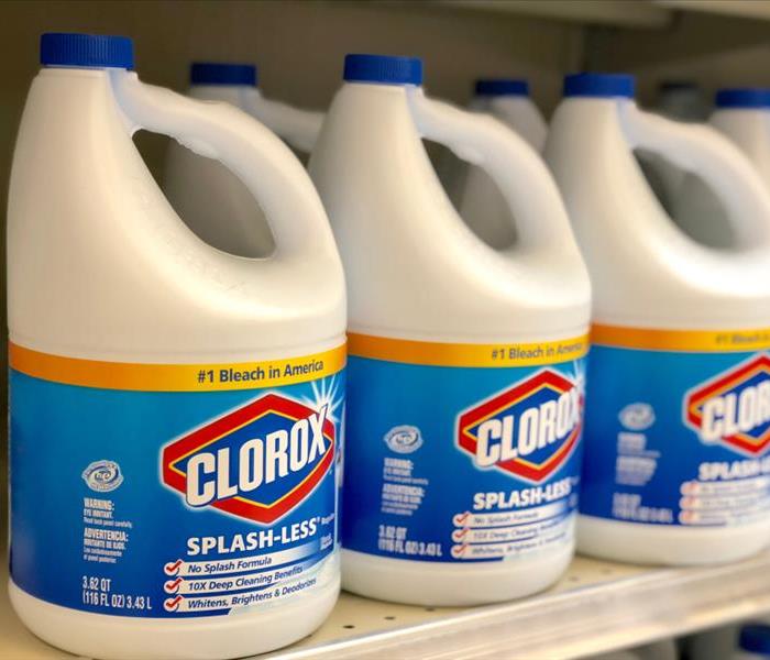 Clorox bleach on white containers on a store shelf.
