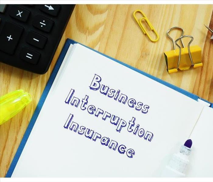 Financial concept meaning Business Interruption Insurance with sign on the piece of paper.